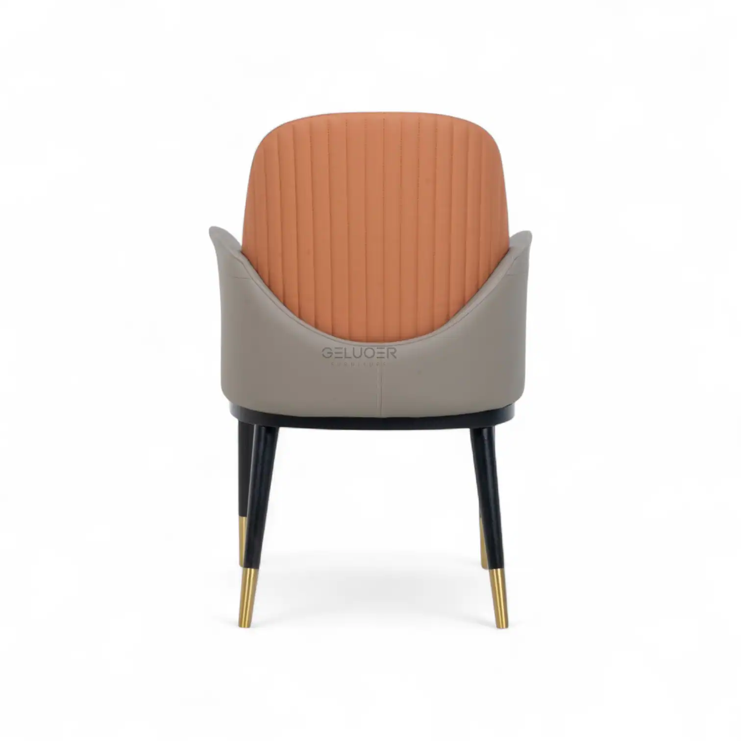 Sleek modern accent chair with beige leather and ribbed orange upholstery, stylish gold-tipped black legs.