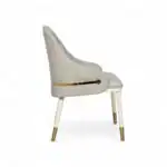 Luxurious white leather accent chair with gold details, Stylish modern furniture for living room decor.
