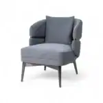 Luxurious gray velvet modern armchair with metal accents and wooden legs.