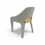 Modern upholstered dining chair with wooden accent, stylish and comfortable.