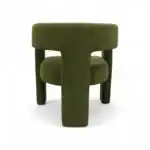 Luxurious green upholstered accent chair with modern design and sturdy wooden legs.