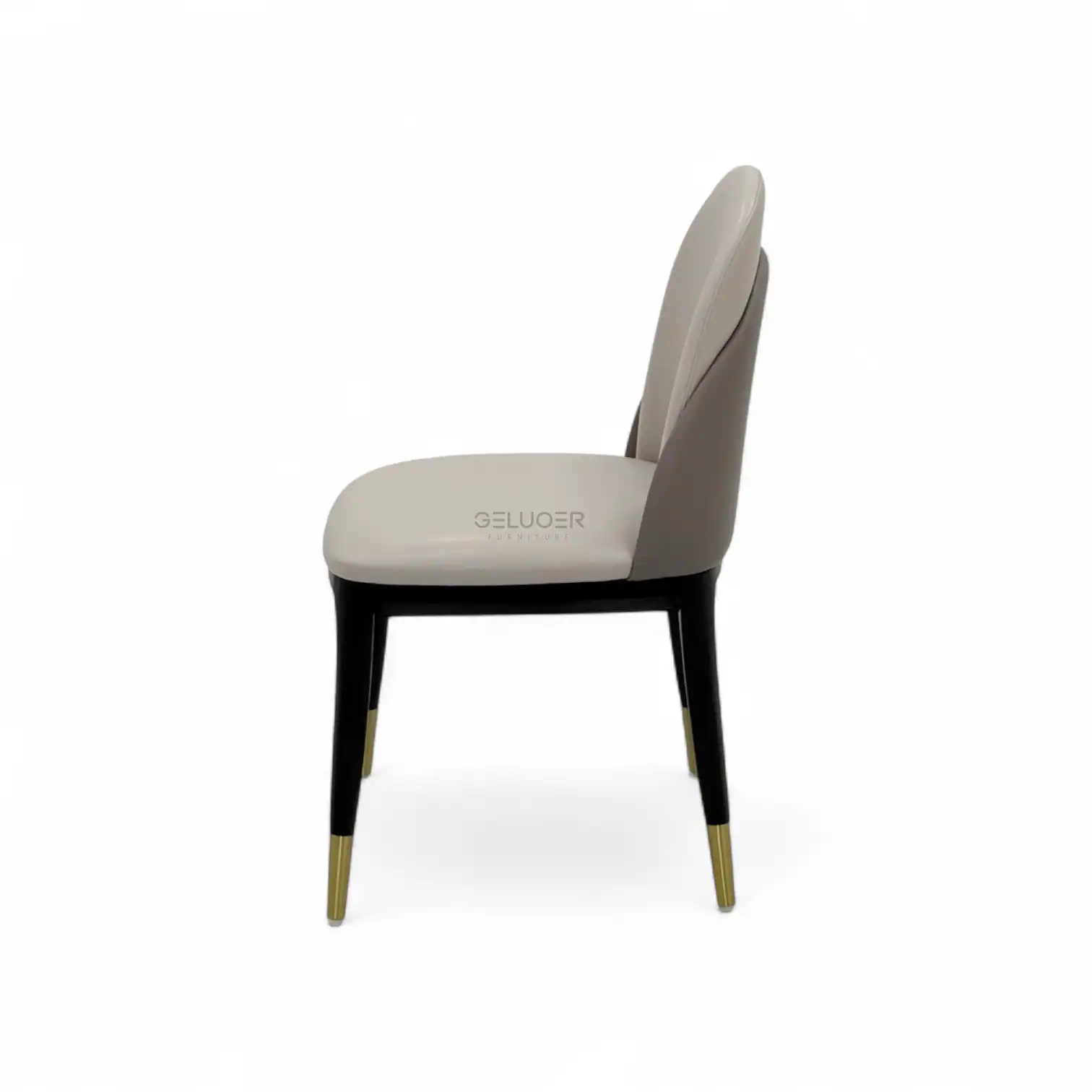 Elegant modern dining chair with upholstered beige seat and backrest, black legs with gold tips - perfect for luxury home decor.