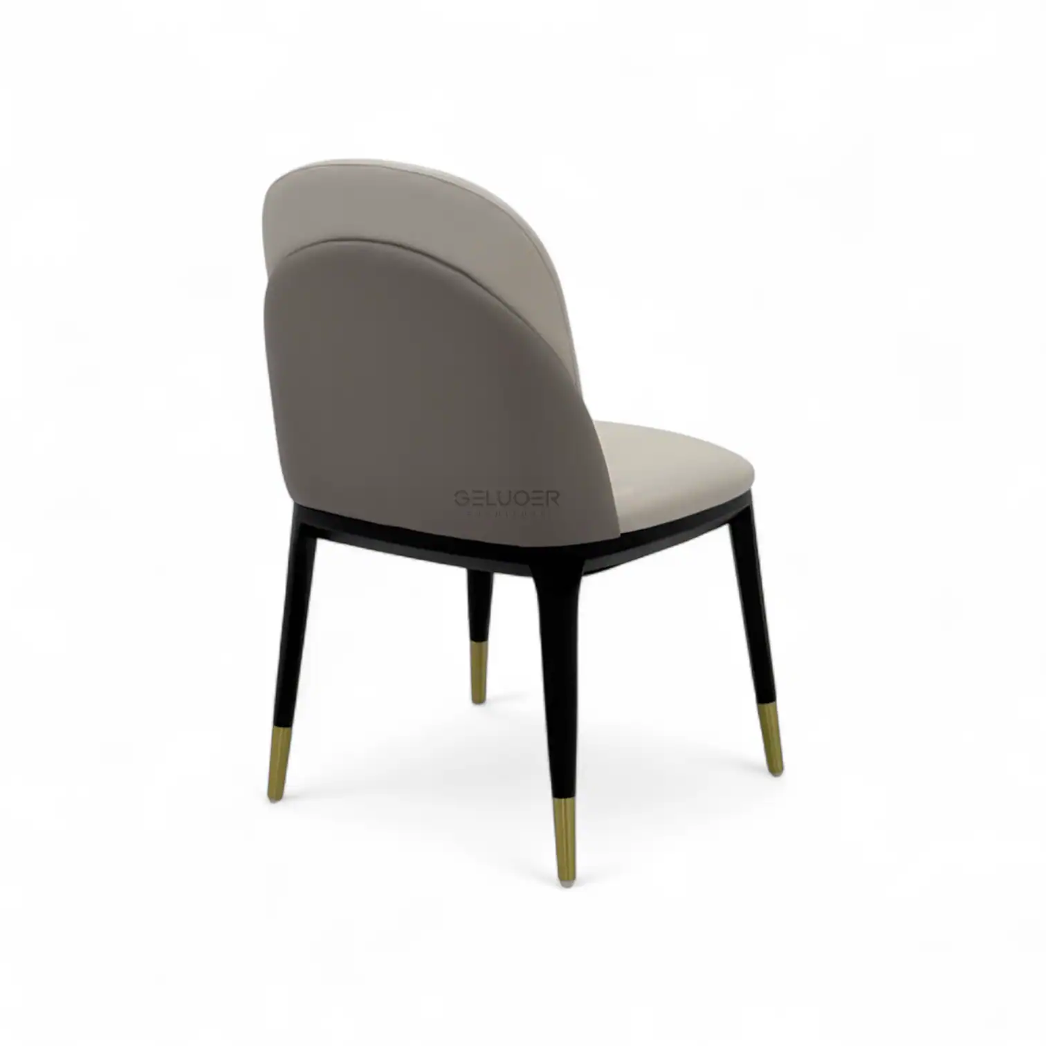 Luxurious modern dining chair with padded upholstery and stylish black and gold tapered legs.