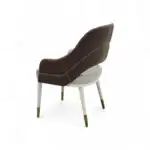 Elegant modern accent chair with brown leather upholstery and gold accents for stylish home decor.