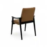 Modern Leather Upholstered Dining Chair with Black Wooden Frame.