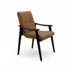 Sleek leather dining chair with black wooden frame, modern and comfortable design.