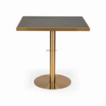 Contemporary gold-finished metal side table with black marble top for modern living spaces.