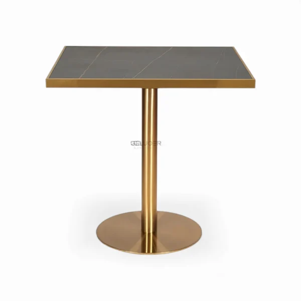 Contemporary gold-finished metal side table with black marble top for modern living spaces.