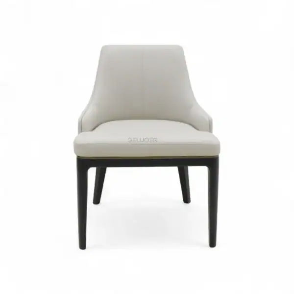 Modern white upholstered accent chair with dark wooden legs, stylish and comfortable furniture piece.