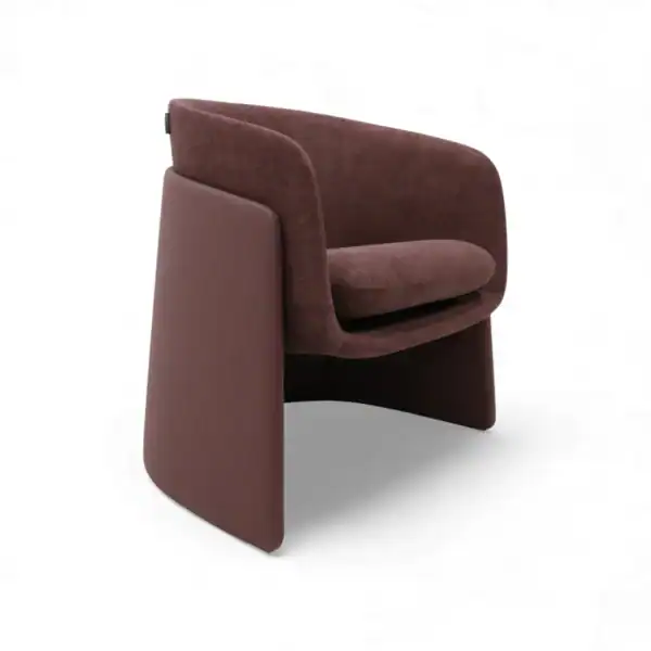 Comfortable velvet lounge chair with modern design and wooden base.