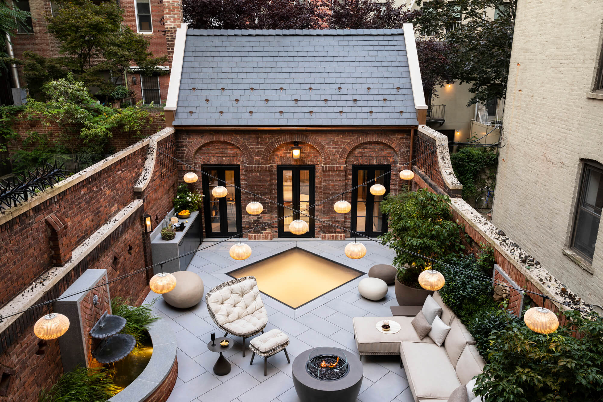 Brick courtyard patio with a recessed SkyFloor walkable skylight bringing daylight to the space below