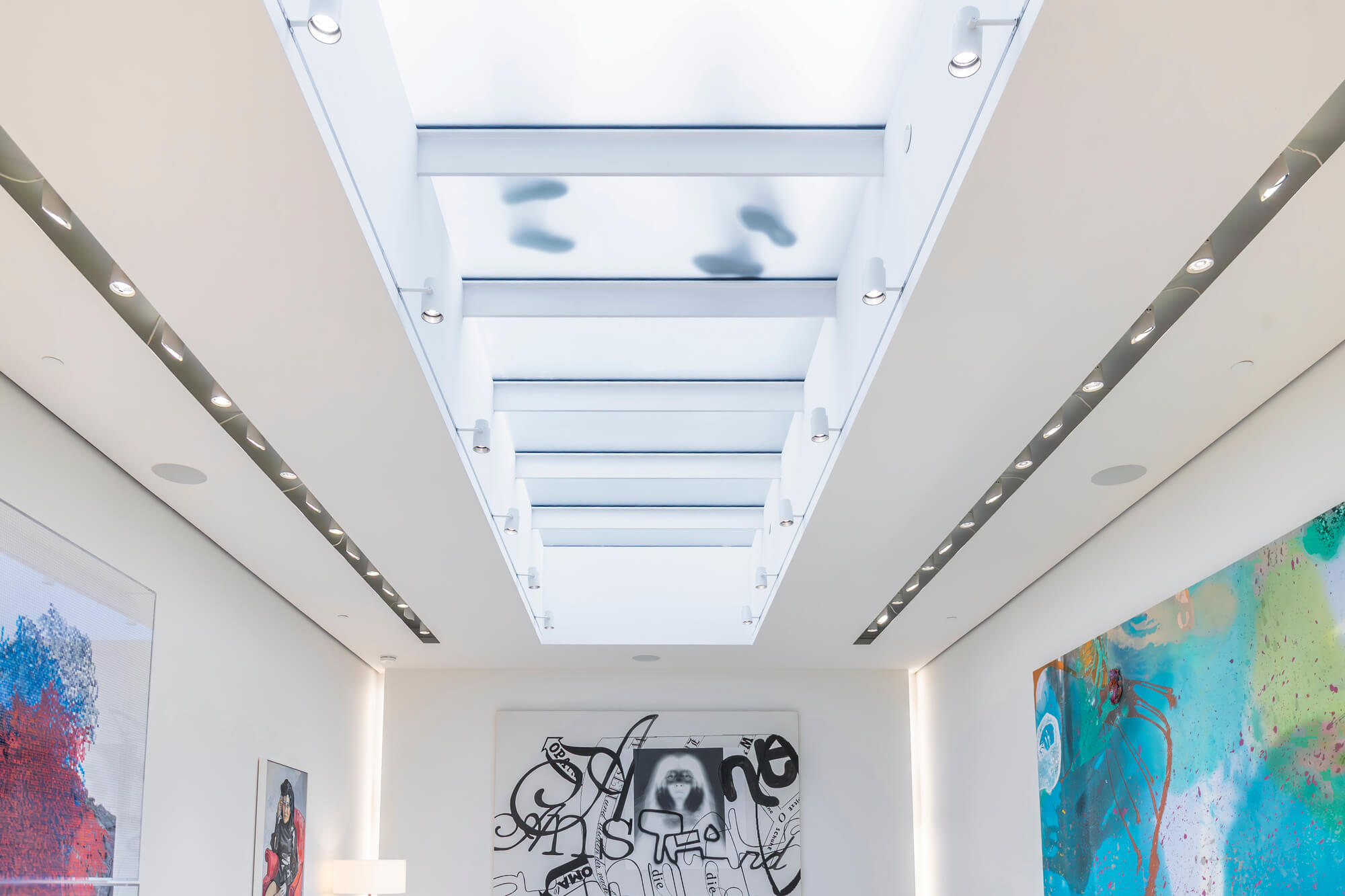 Art gallery with a textured walkable glass skylight roof