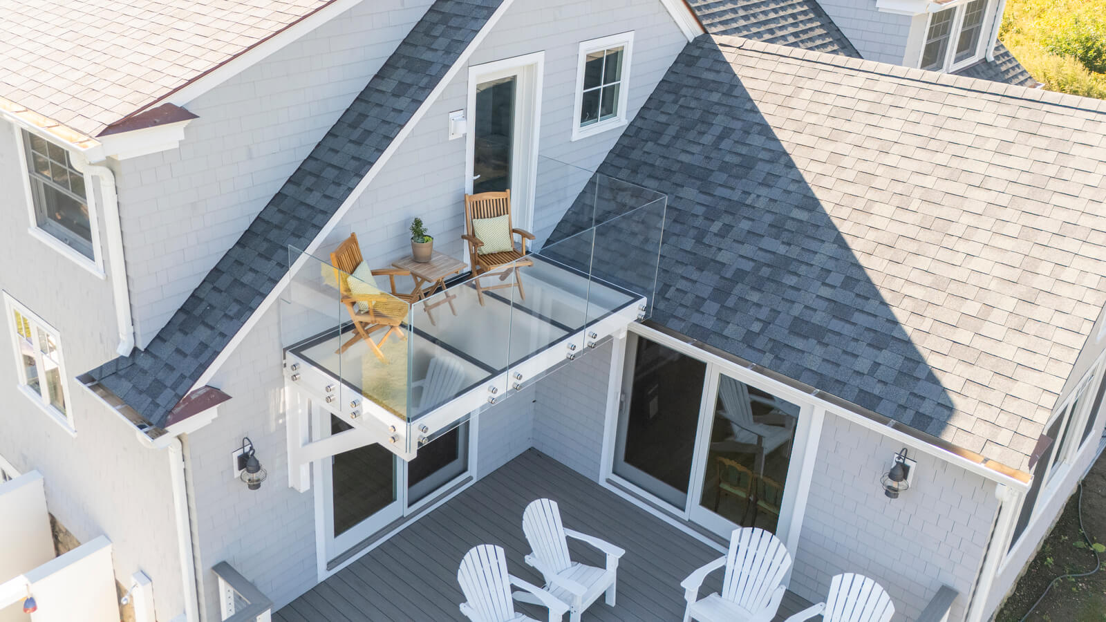 Aerial view of a home roof deck with a SkyFloor walkable skylight