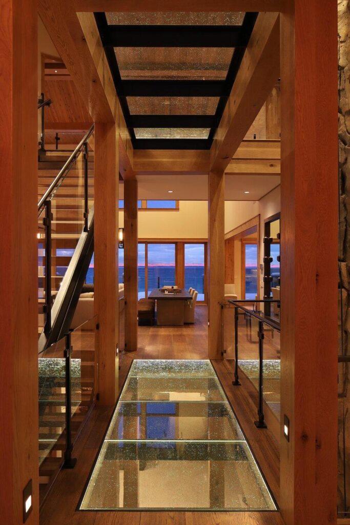 Modern rustic house with laminated structural glass floors and walls