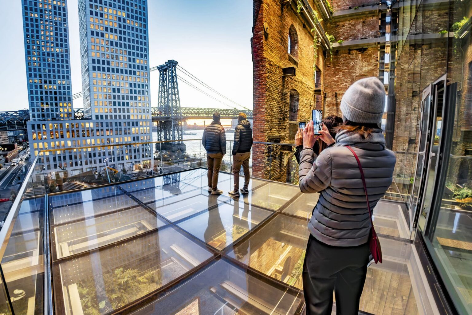 Walkable glass deck panels on a rooftop view deck overlooking the city and river