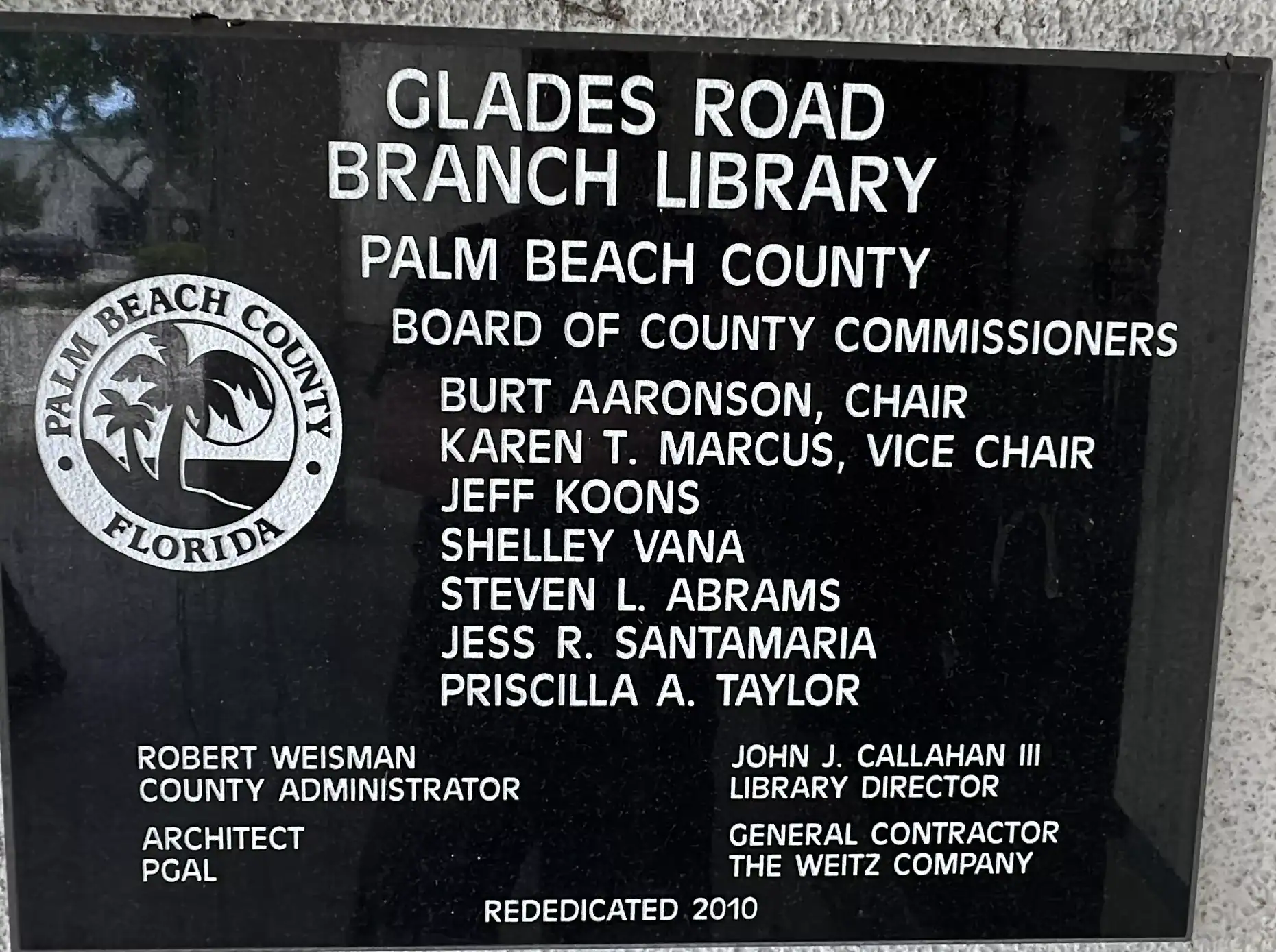 Plaque showing who the county commissioners were when the library was rededicated. Palm Beach County Library Glades Road GCNN Good Citizen News Network goodcitizennewsnetwork.com News That's Not Fake