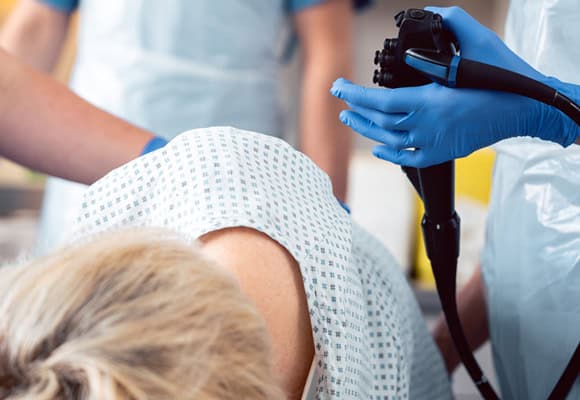Medical professional performing fertility procedure with ultrasound at Grover Gastro and Fertility.