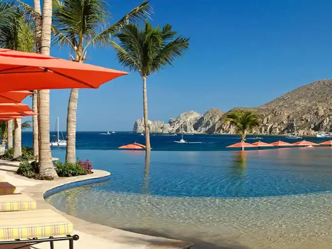 Hacienda Oceanfront Villa With Pool, Palm Trees, And Mountain View In Cabo San Lucas.