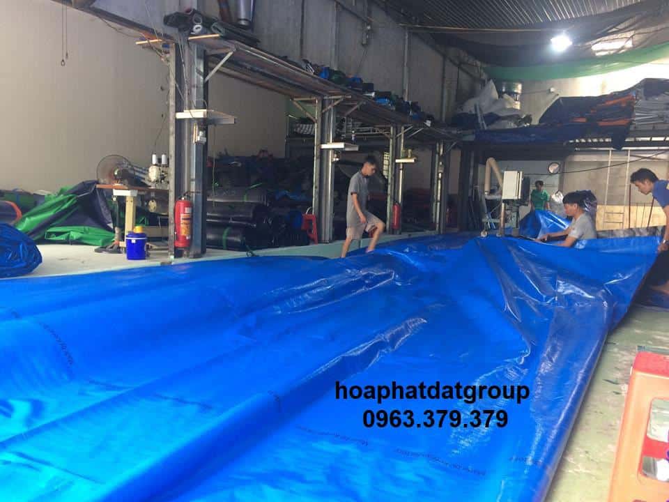 quy trình gấp gọn Bạt nhựa xanh cam 2 mặt Hòa Phát Đạt