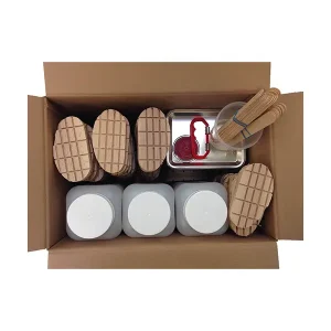 Cardboard box with art supplies organized inside.