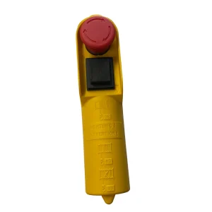 Yellow machine safety switch with red emergency stop.