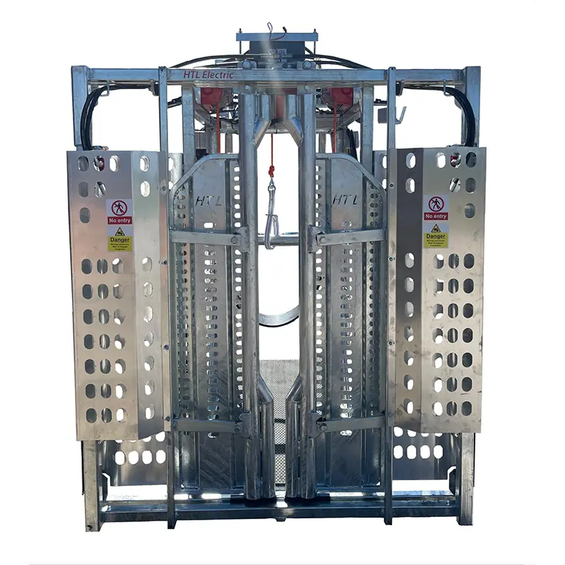 Cattle handling crush with safety features.