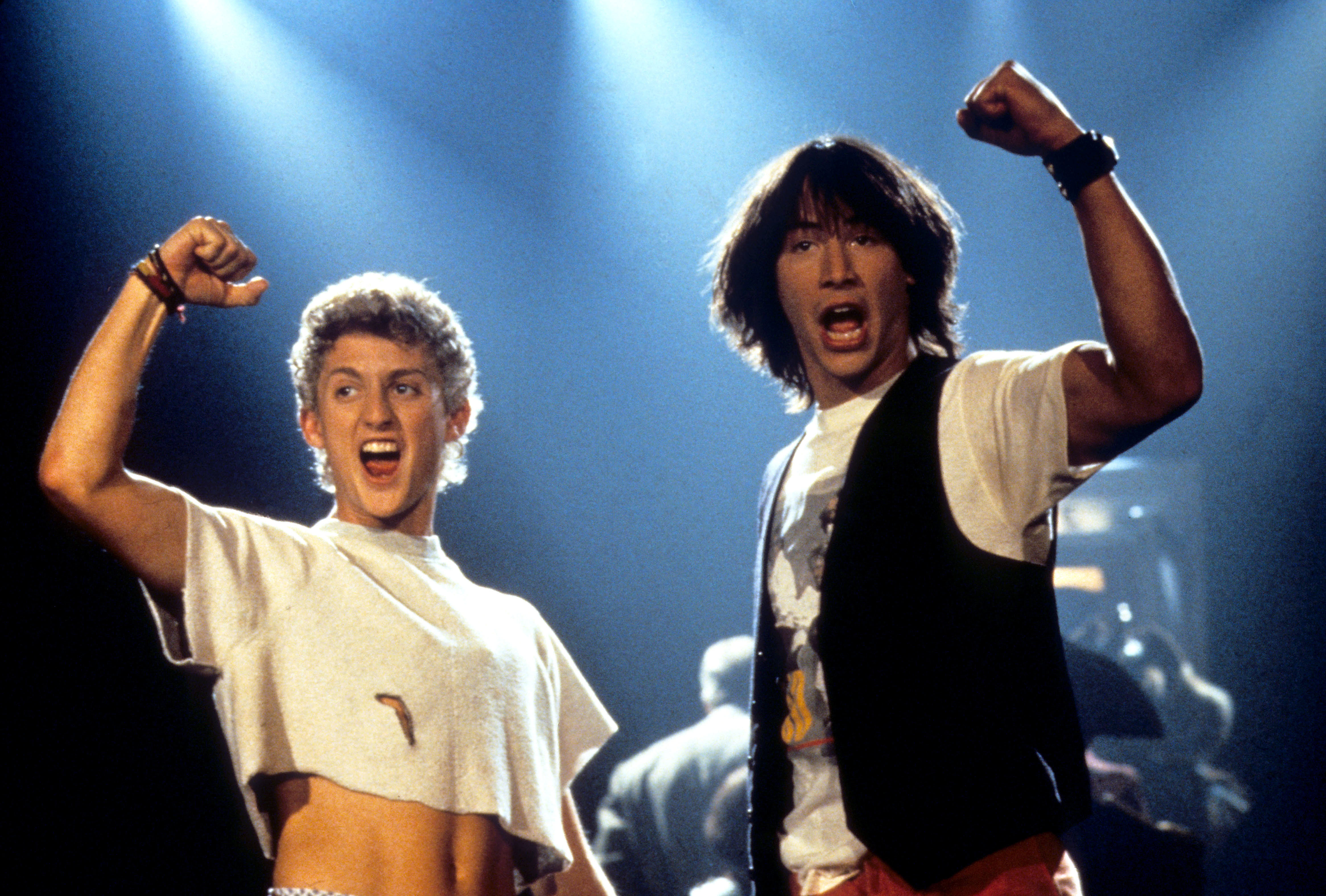 Still from Bill & Ted's Excellent Adventure showing Bill and Ted celebrating victory.