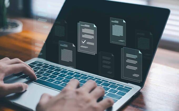 Digital documents and collaboration on a laptop screen.