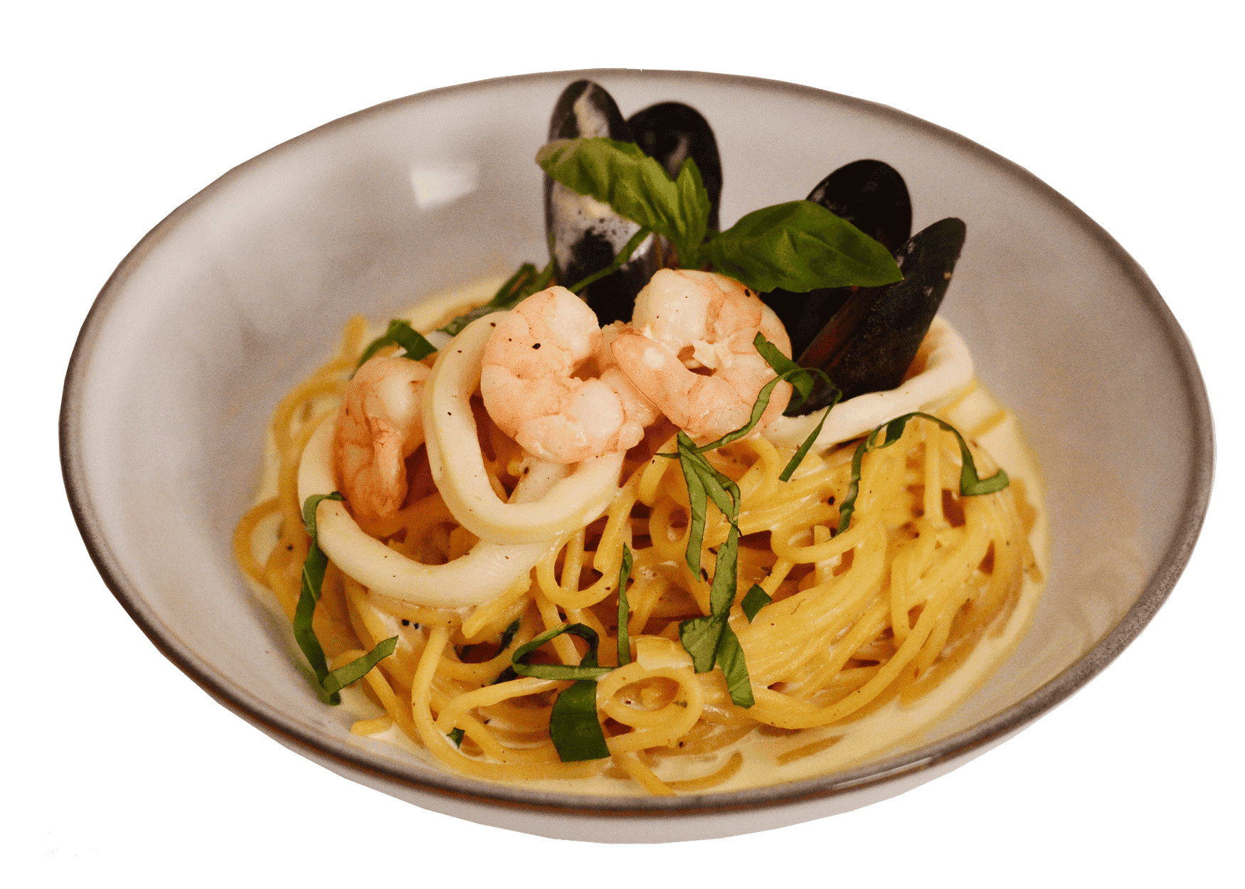 idocatering agarlic creamy seafood pasta served on white plate 