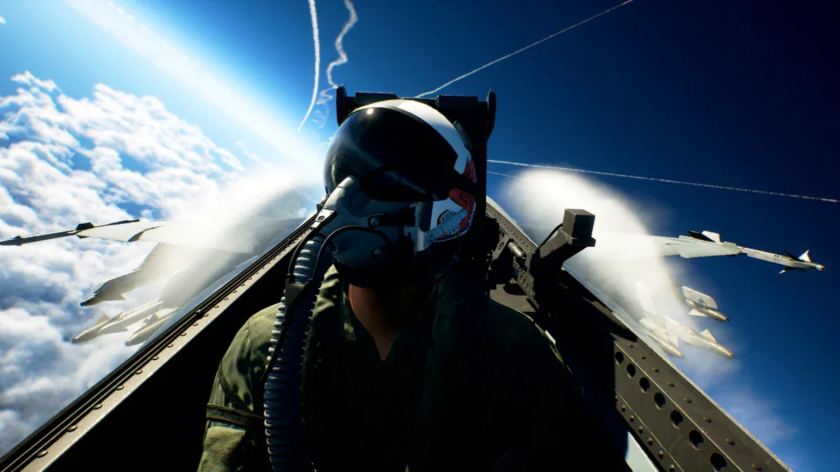 A pilot looks back from the cockpit above the clouds as missiles streak past in Ace Combat 8: Wings of Theve