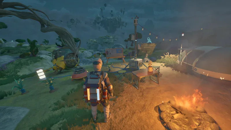 An explorer stands by a campfire at a night camp with a parked Wasp in ATMOSFAR