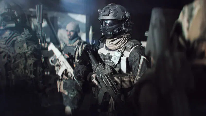 A heavily armed soldier waits in a dark facility in Battlefield 6