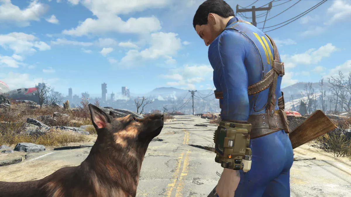The Sole Survivor and Dogmeat look out over the wasteland in Fallout 4