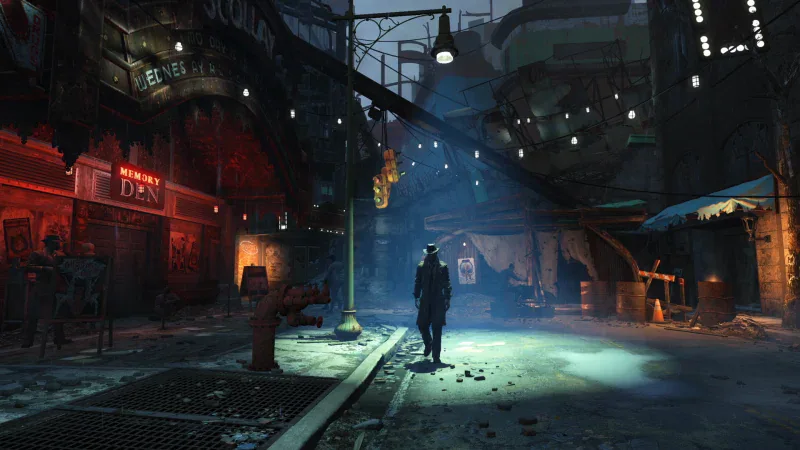 A lone survivor walks down a lamp-lit street at night in Fallout 4