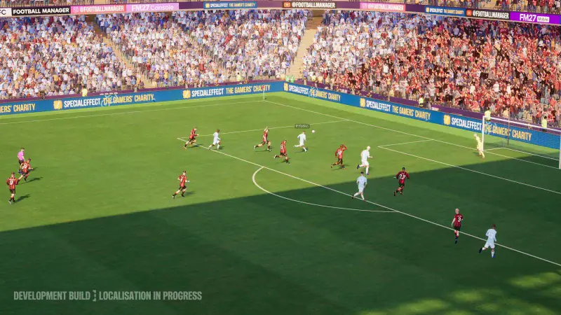 A sunny Football Manager 27 match with a full crowd and pitchside advertising boards