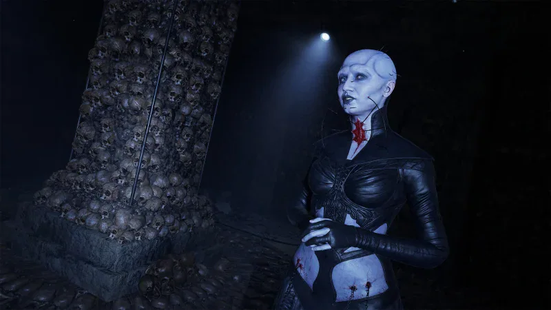 A Cenobite stands beside a pillar of skulls in the Labyrinth in Hellraiser: Revival