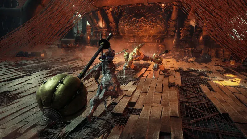 Soul swinging a huge spiked hammer at three golden monks in Phantom Blade Zero