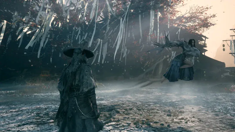 A floating swordswoman attacking Soul beneath a tree hung with white paper streamers in Phantom Blade Zero