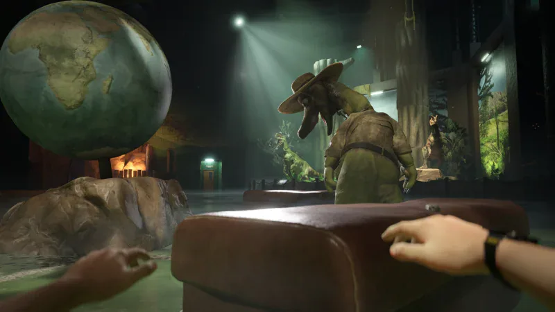 First-person climb over a ledge in a dinosaur exhibit hall in Terrible Lizards
