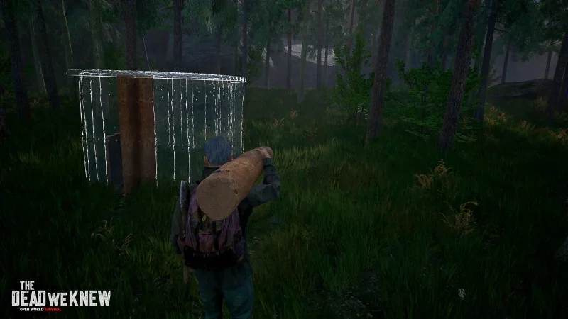 A survivor carries a log through a dark forest past a trip-wire fence in The Dead We Knew