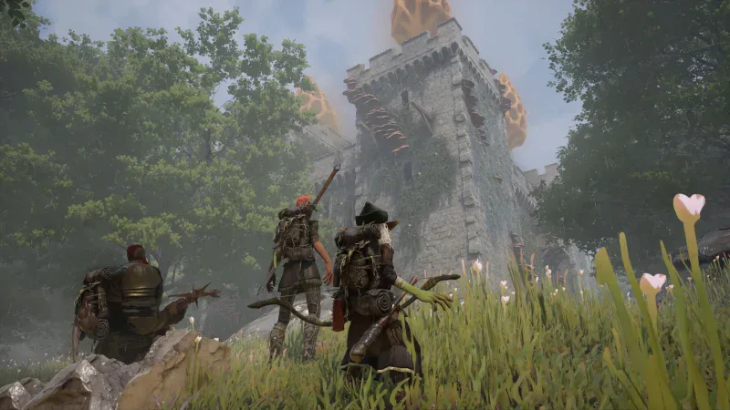Two adventurers walk through tall grass towards a ruined tower in Wyldheart