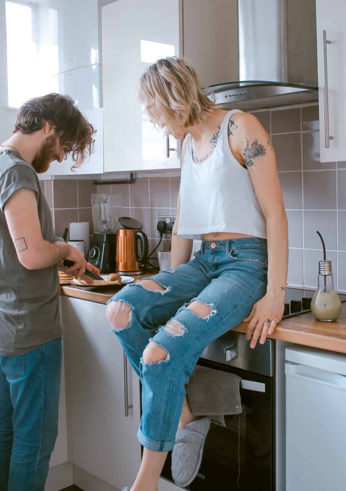 Couple cooking in the kitchen.