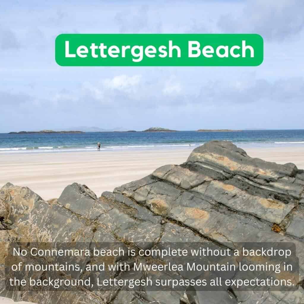 Lettergsh Beach, scenic Irish seaside with rocky shoreline and mountain backdrop.