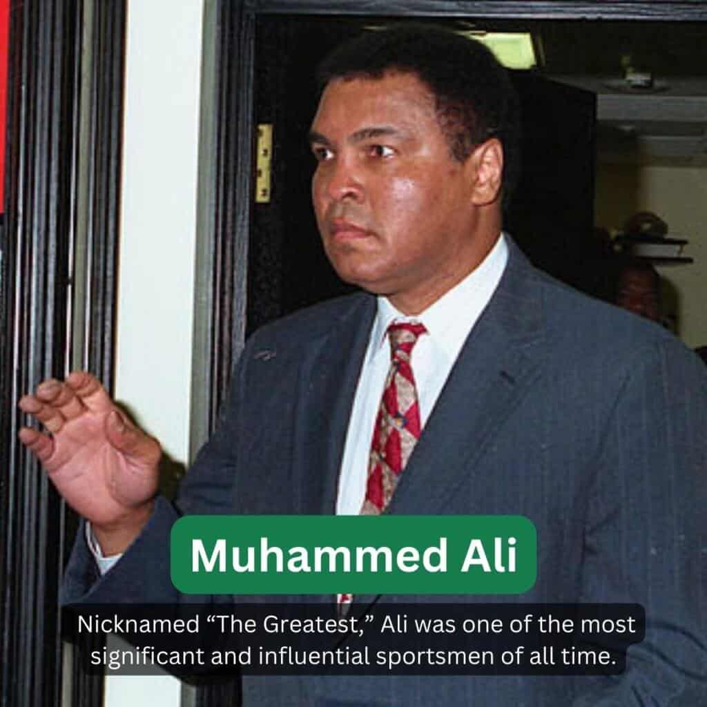 Muhammad Ali in a tailored suit and tie.