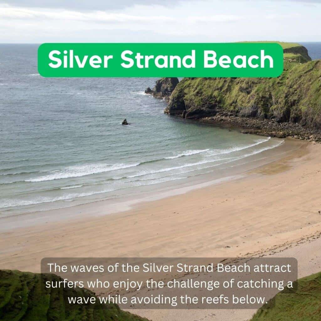 Waves crashing on Silver Strand Beach, surrounded by rugged green cliffs in Ireland.