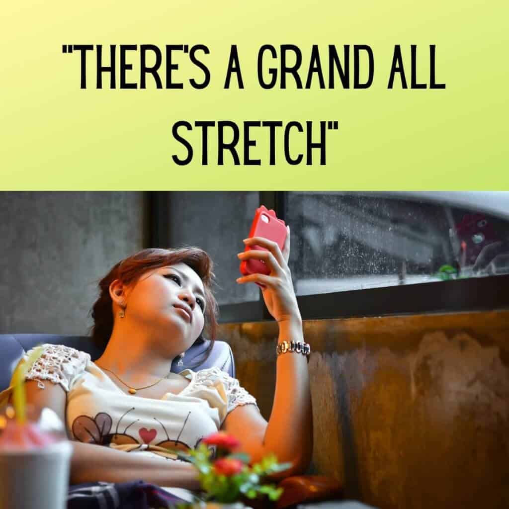 Relaxed woman looking at her smartphone in a cozy cafe in Ireland.