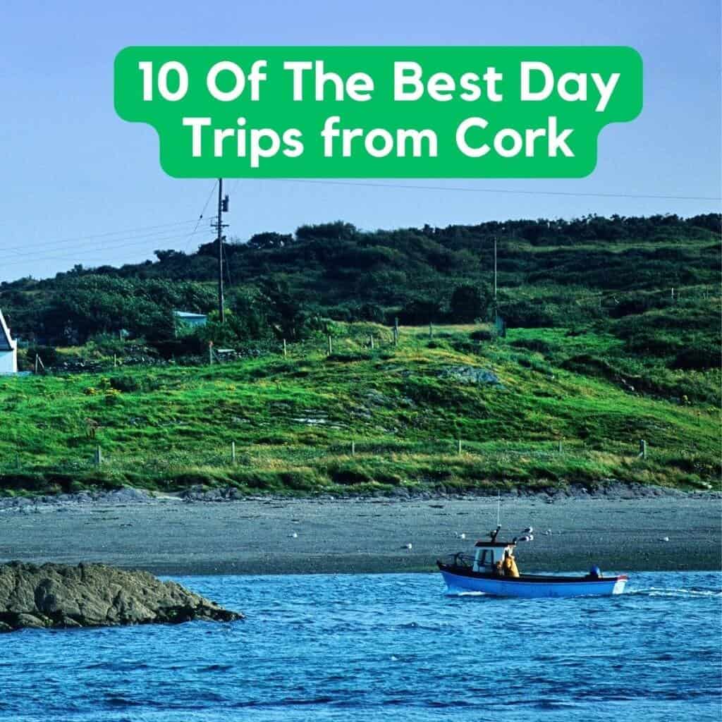 Scenic view of Cork coast with a boat sailing near the shoreline.