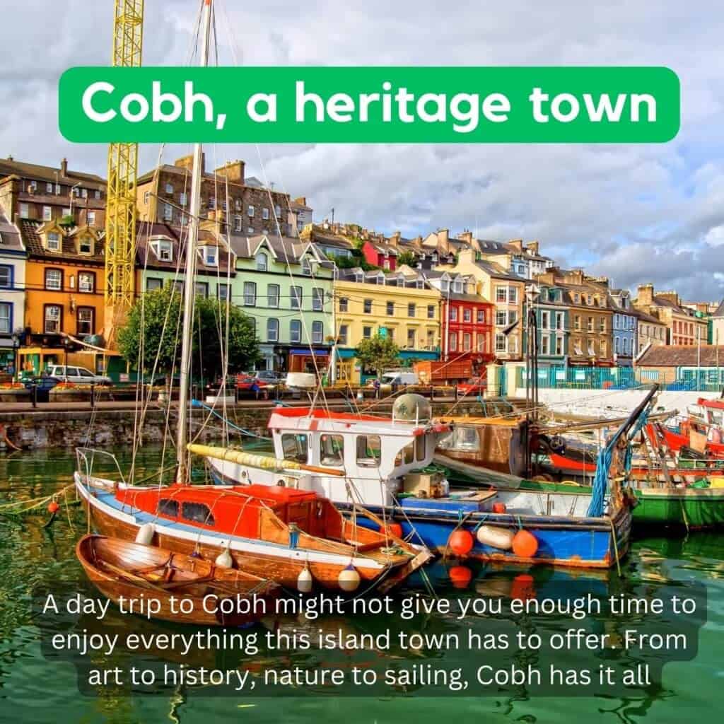 Colorful boats docked at Cobh harbor with vibrant townhouses in the background.