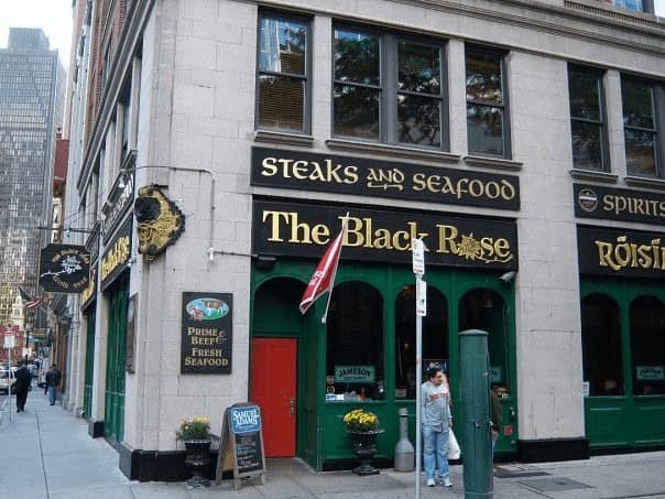 Vibrant exterior of The Black Rose Irish pub in downtown Ireland.