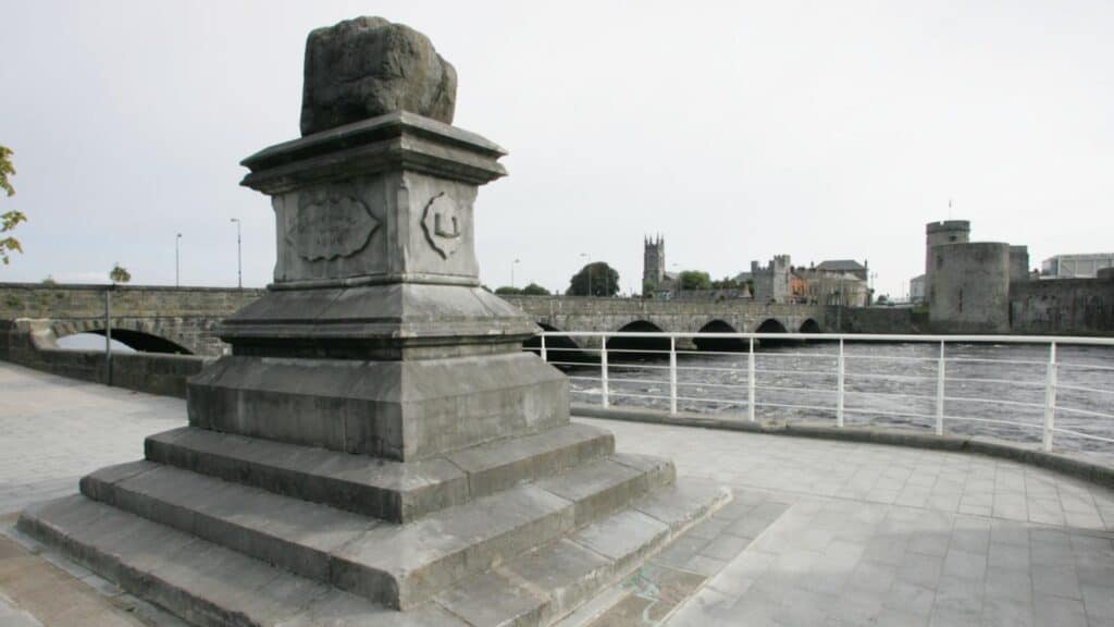 Ancient stone monument along River Shannon in Limerick, Ireland.